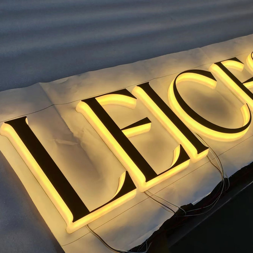 Custom acrylic egde illuminated letters sign with brushed gold metal face
