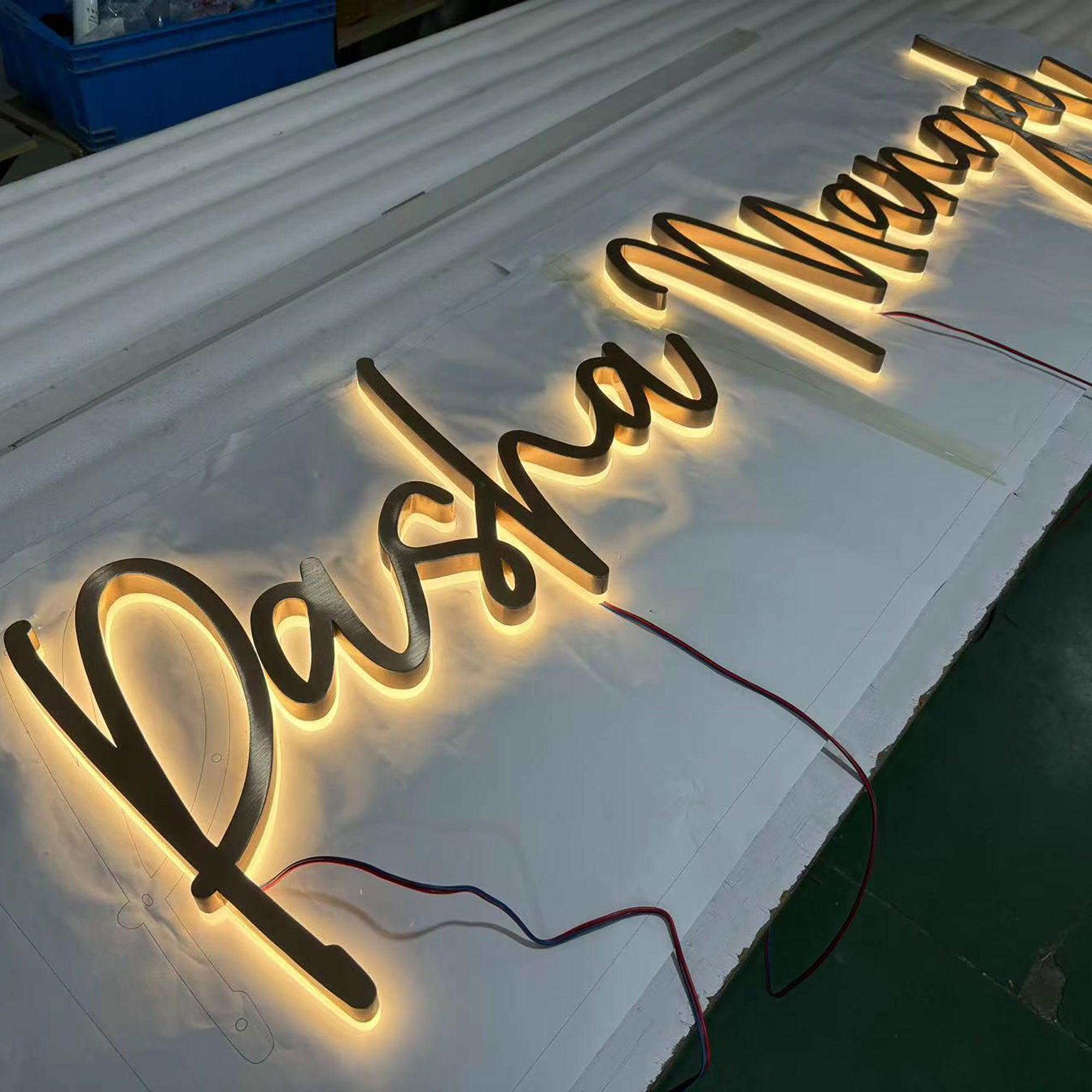 Custom design rose gold finish backlit channel letters business sign