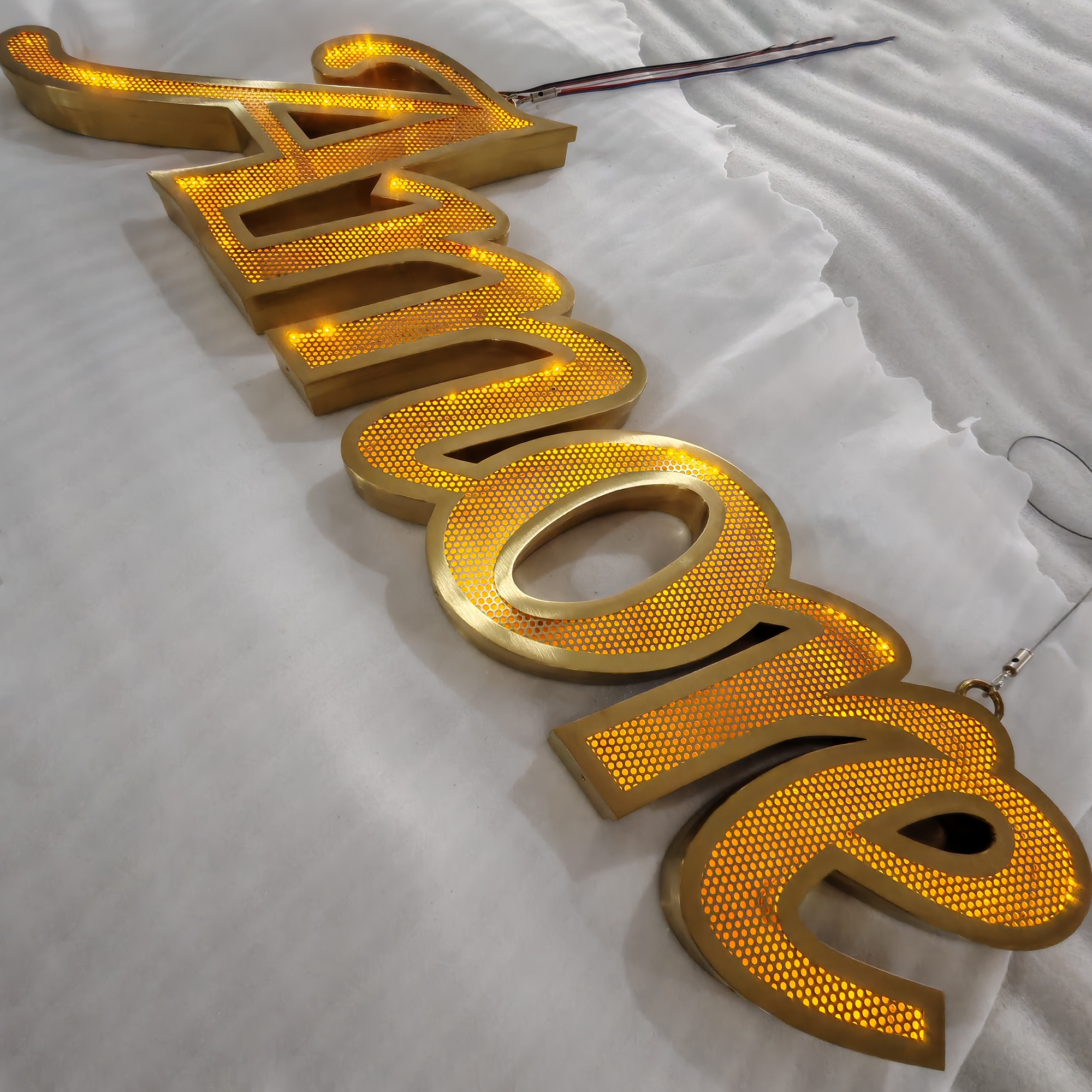 Custom shop front led signboard gold brushed stainless steel frontlit channel letters with flowing leds