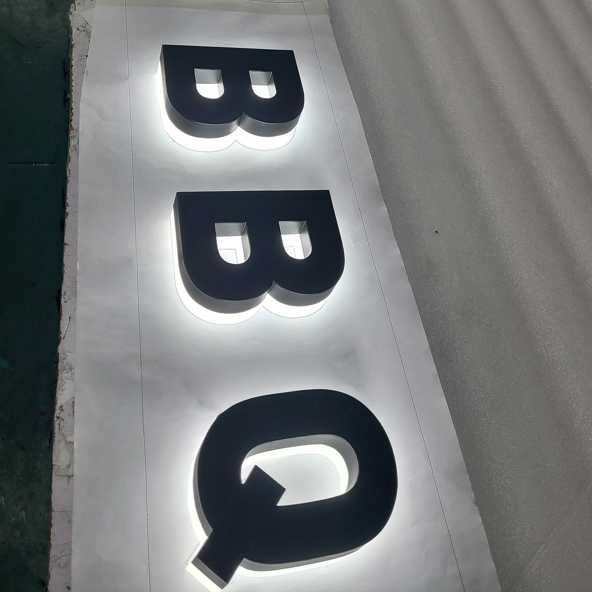 Backlit stainless steel channel letters – sunsignus
