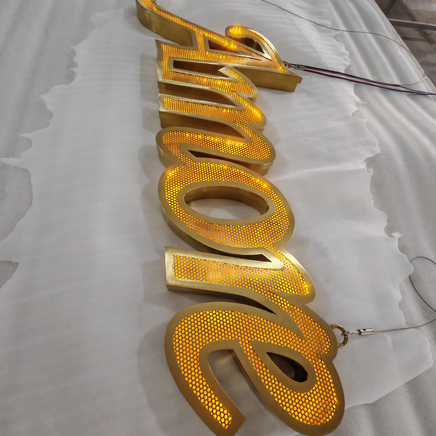 Custom shop front led signboard gold brushed stainless steel frontlit channel letters with flowing leds