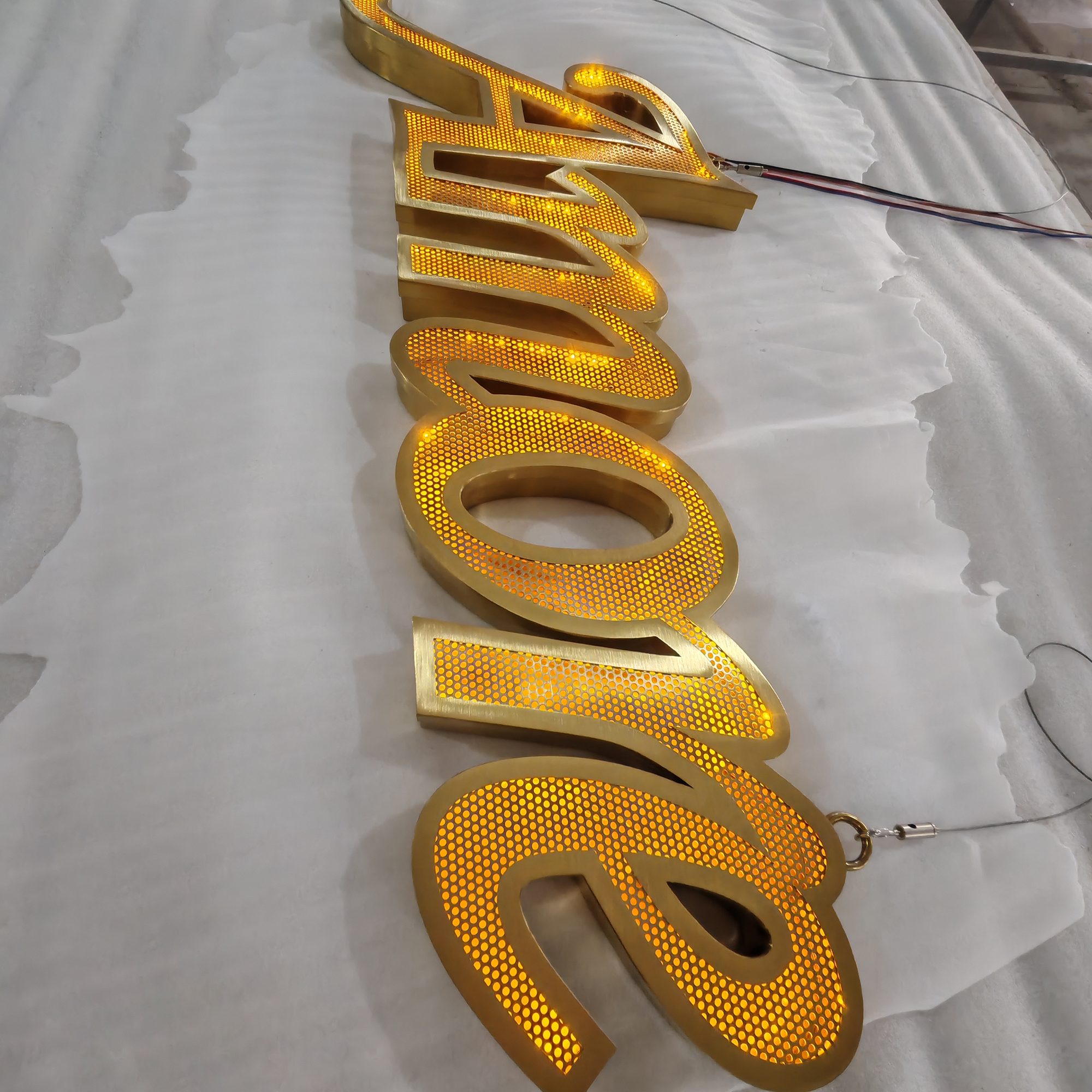 Custom shop front led signboard gold brushed stainless steel frontlit channel letters with flowing leds