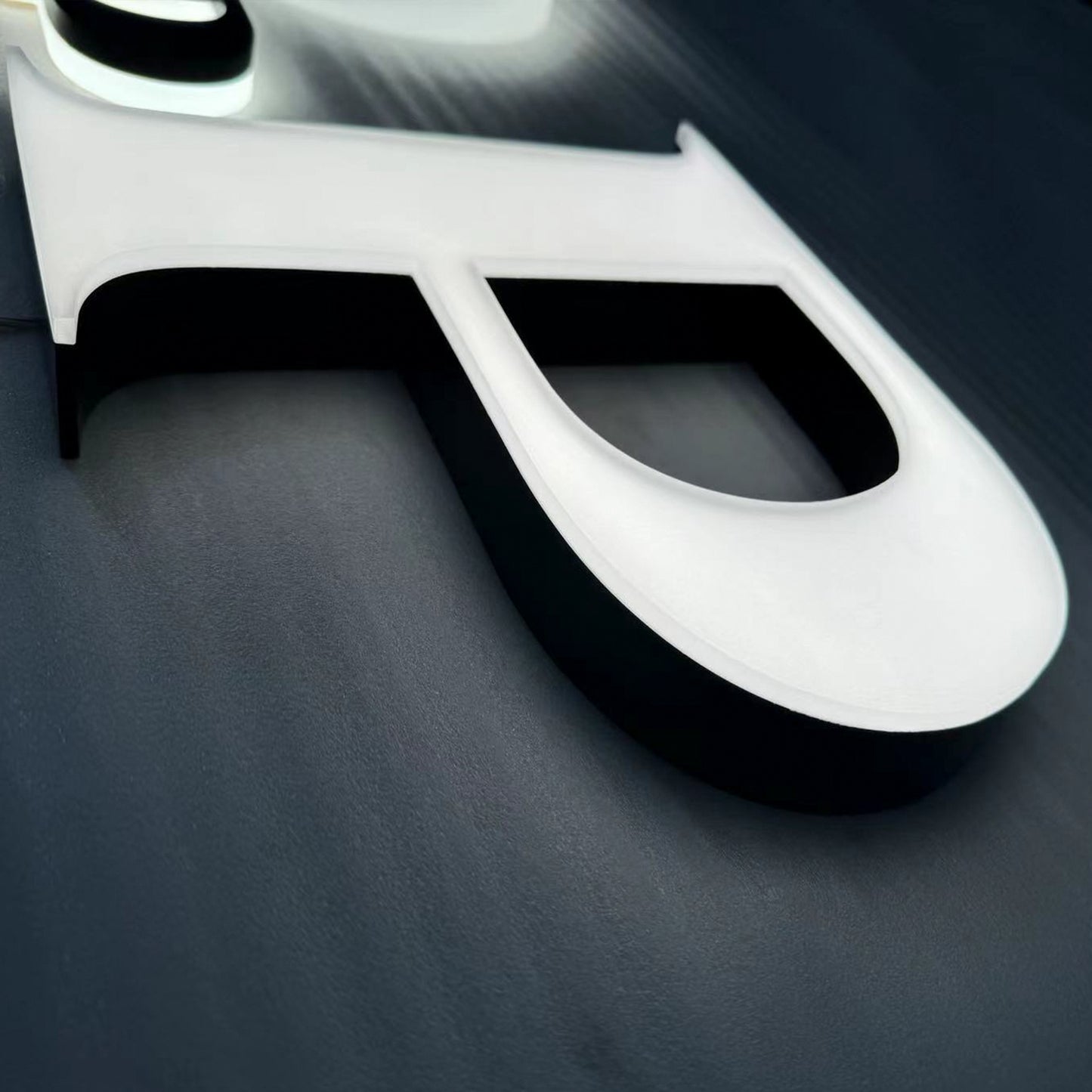 Custom painted stainless steel 3D letters reverse lit channel letters exterior company wall brand signs