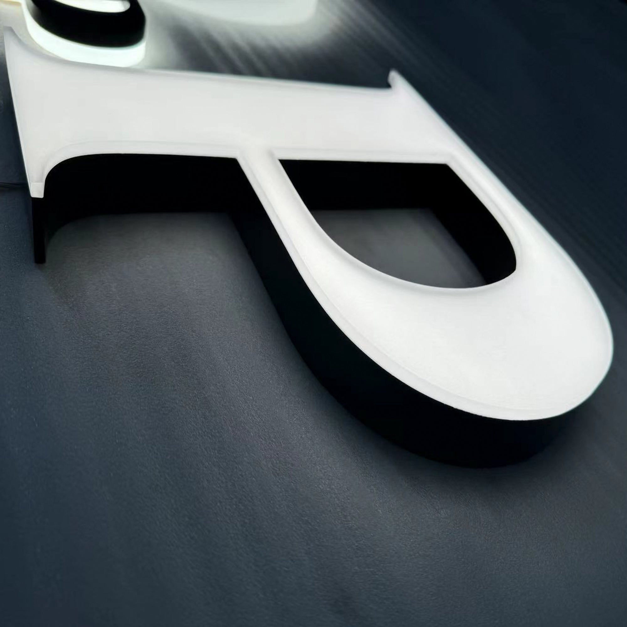 Custom painted stainless steel 3D letters reverse lit channel letters exterior company wall brand signs